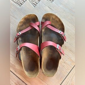Birkenstock   Mayari sandals.